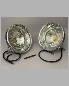 A pair of large Lucas automobile driving lamps, 1950's, model R100L